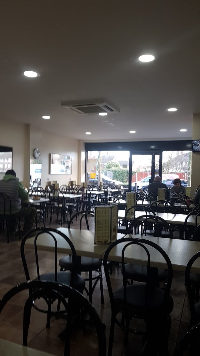 Tables and bentwood chairs by the front window
